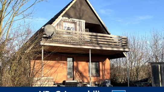 Feldrandlage: Vermietetes Einfamilienhaus mit Sanierungsbedarf in Rade b. Hohenwestedt